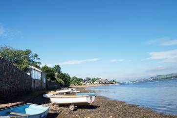 Low water along the river to the left of the slipway.