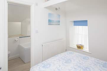 Bedroom 1 has an en suite bathroom.