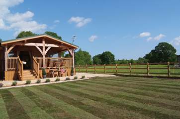 This bespoke wooden framed Lodge has a really luxurious interior and is in a private setting with a lovely feeling of open space around it.