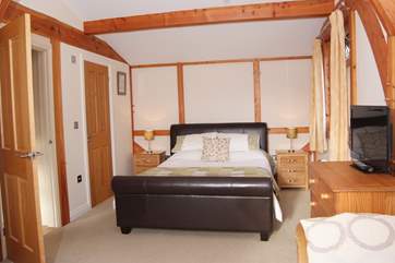 There is a king-size bed in this king-size bedroom!
