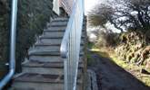 Steps access the cottage and the adjoining footpath leads up to the top of the Beacon. - Thumbnail Image