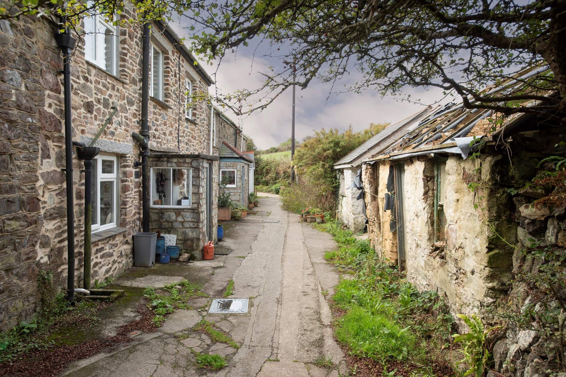 The footpath leads from the car parking space to the cottage.