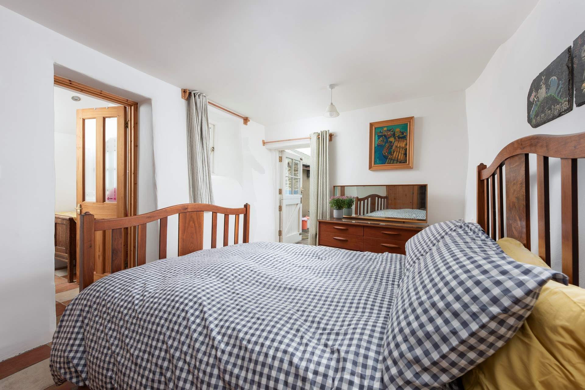 The en suite shower-room is just off the bedroom.