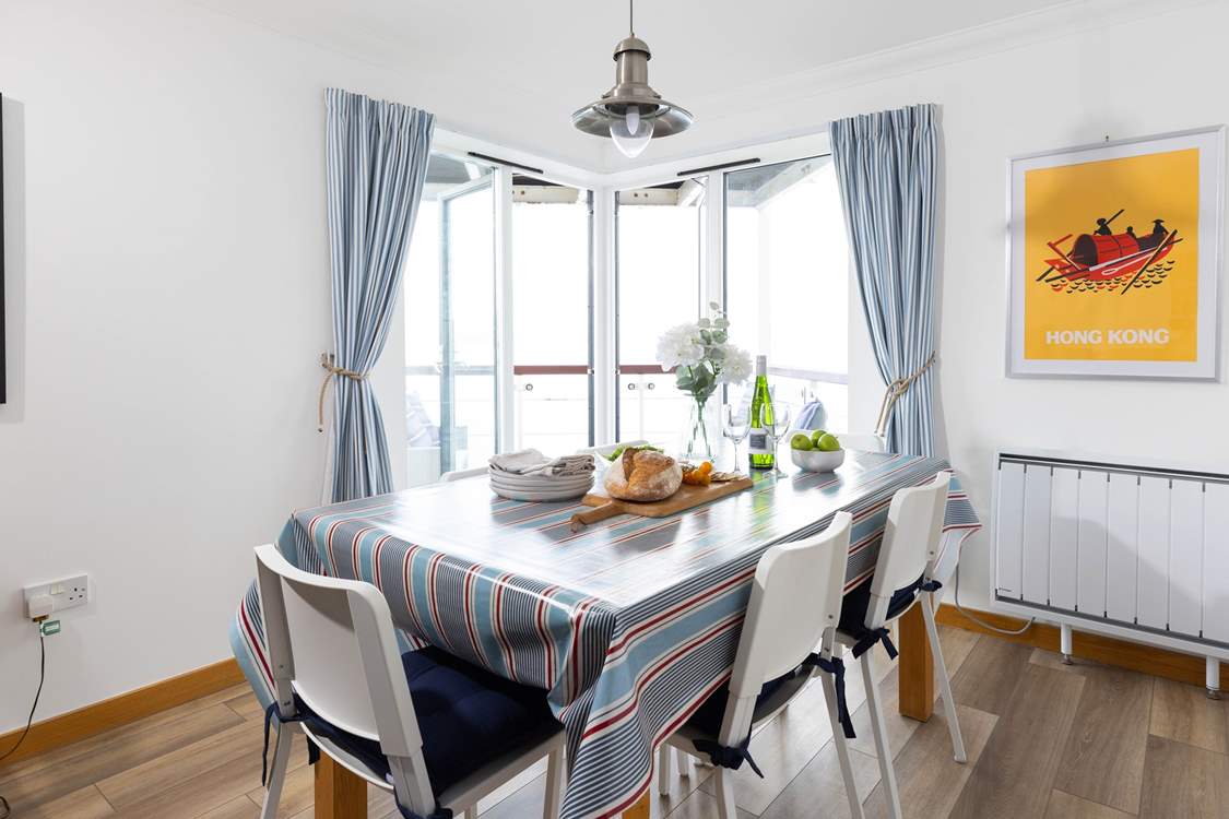 The dining-area opens onto the balcony.