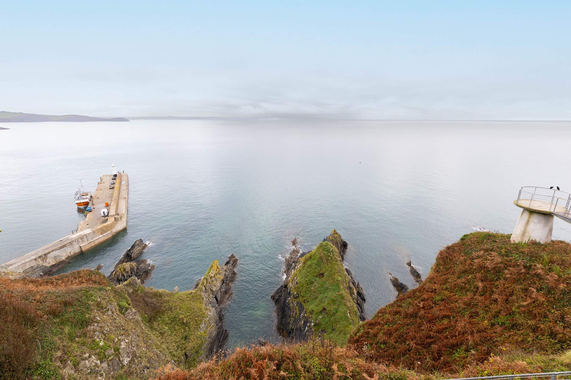 Looking down from the balcony; seals are sometimes seen on the rocks below.