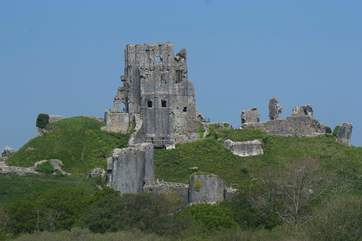 This dramatic view of Corfe Castle is a two minute walk from the cottage.