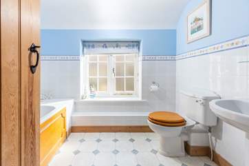 The family bathroom is conveniently located between the bedrooms.
