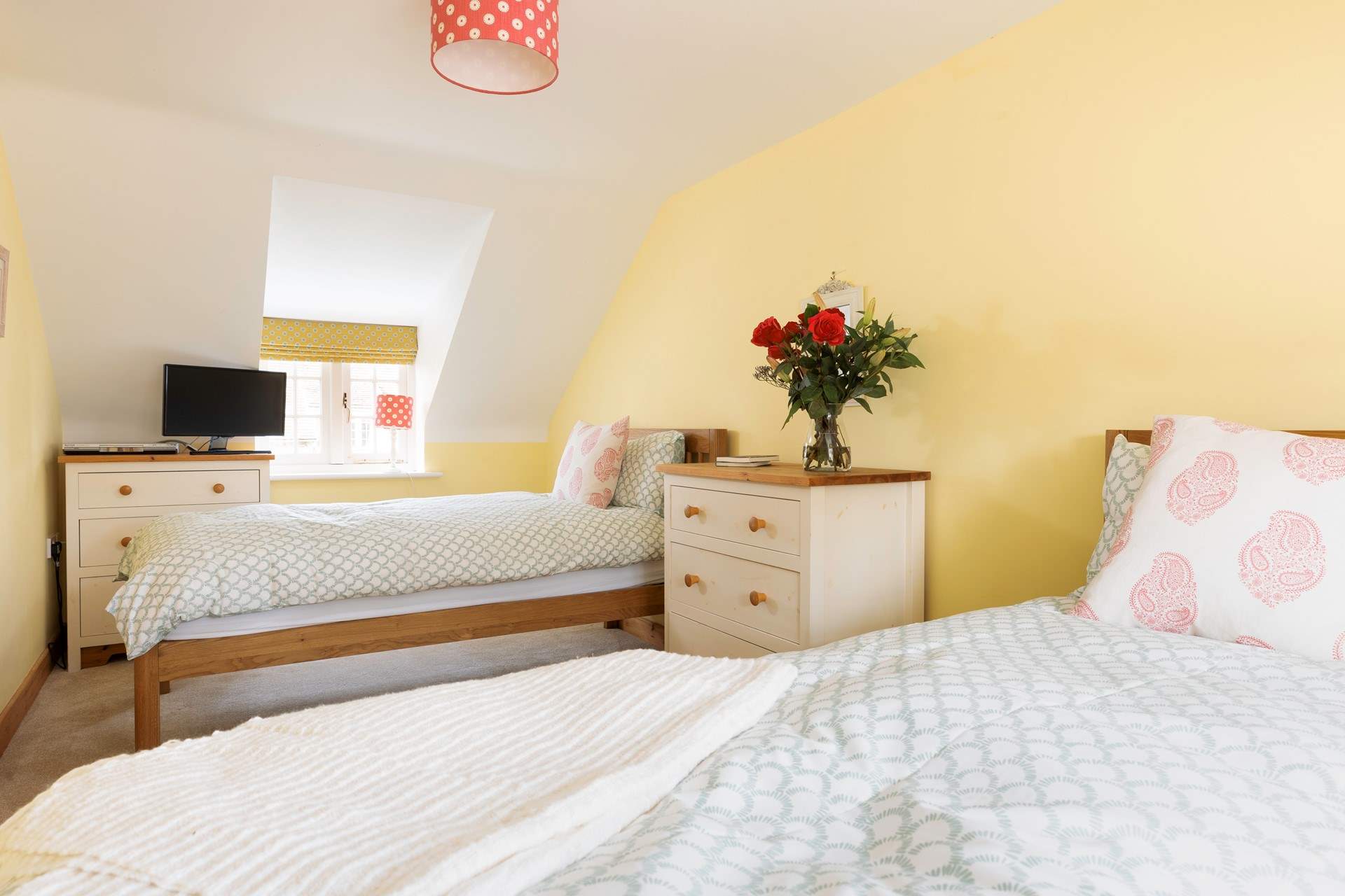 The bright twin room will delight adults and children alike.