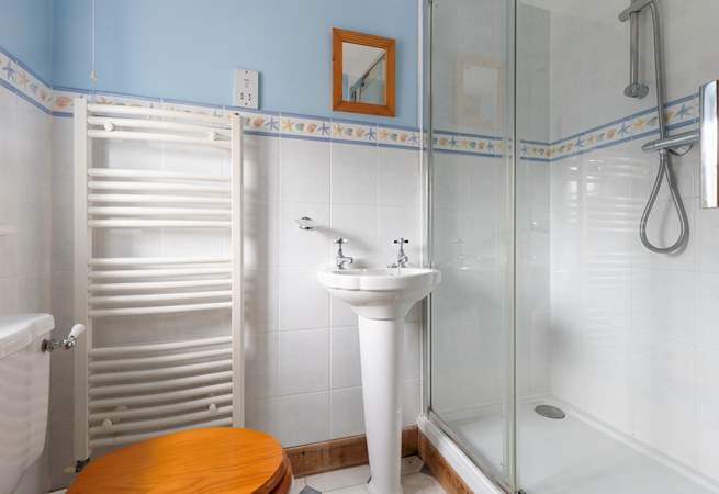 No queues in the morning with this useful en-suite shower room.