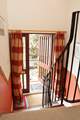 Looking down from the living/dining-room to the entrance hall.
