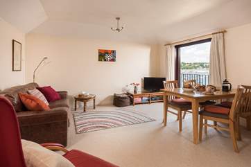 Enjoy the view from the sofa and the dining-table.