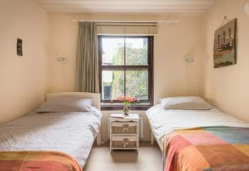 The twin bedroom is decorated in lovely warm colours (Bedroom 2).