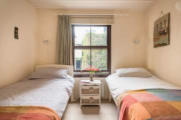 The twin bedroom is decorated in lovely warm colours (Bedroom 2).