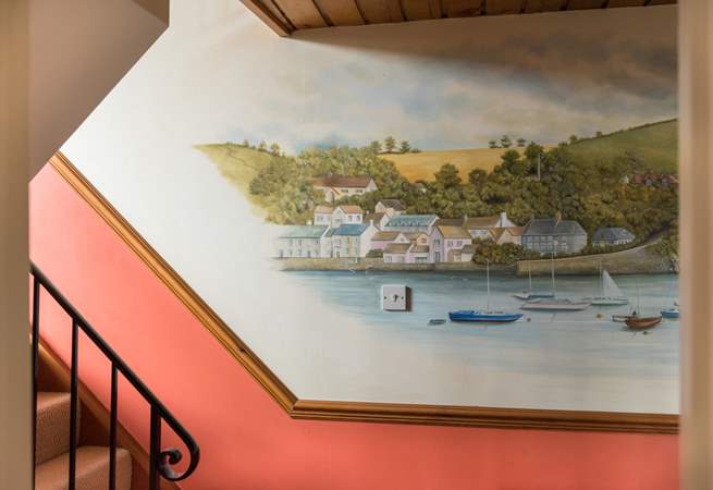 A mural of Flushing decorates the hallway by the bedrooms.