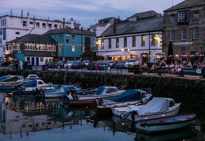 Enjoy a drink at Customs House Quay in Falmouth.
