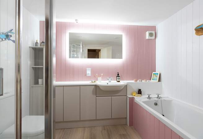 The fabulous family bathroom has a bath and separate shower. 