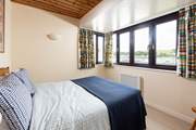 The main bedroom has the most tranquil outlook over Falmouth.