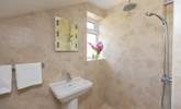 The en suite wet-room is down a couple of steps from the main bedroom. - Thumbnail Image