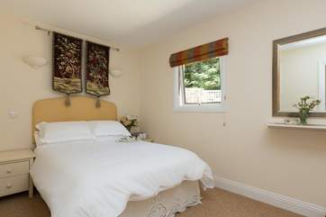 This is the other double bedroom, just as calming and comfortable as the master.
