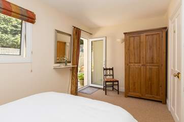There is a door to the patio so you can lie in bed, and let the fresh morning air and the sound of birdsong in.