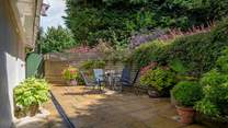 There is also a private sheltered area at the side of the Lodge. It is quite a suntrap. This area can be enclosed if you wish.
