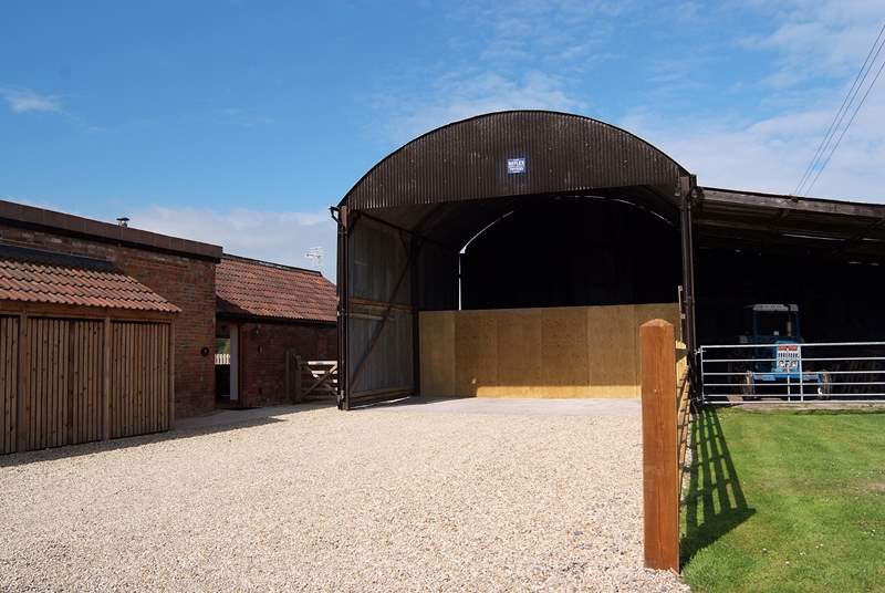 This immaculately tidy barn is set aside for guests' parking and bikes etc. The front entrance to the cottage is just to the left.