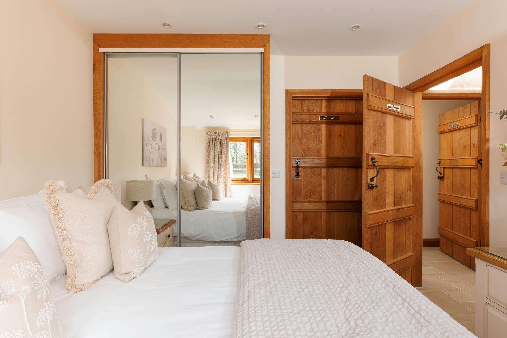 The en-suite shower room can be access from Bedroom 2, or the hallway, as you can see with the doors here.