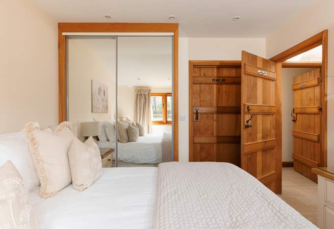 The en-suite shower room can be access from Bedroom 2, or the hallway, as you can see with the doors here.