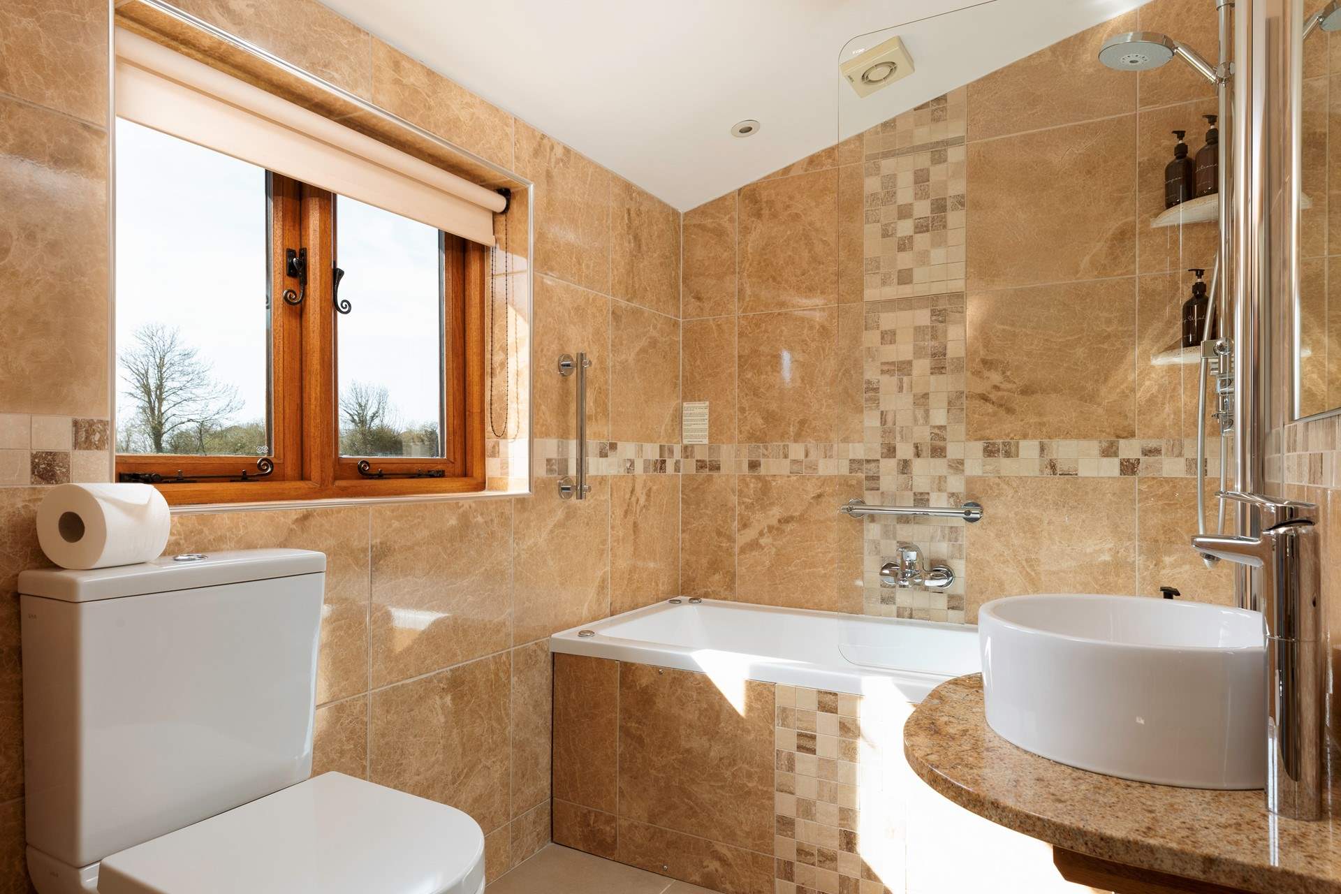 The en-suite bathroom is just off Bedroom 1.