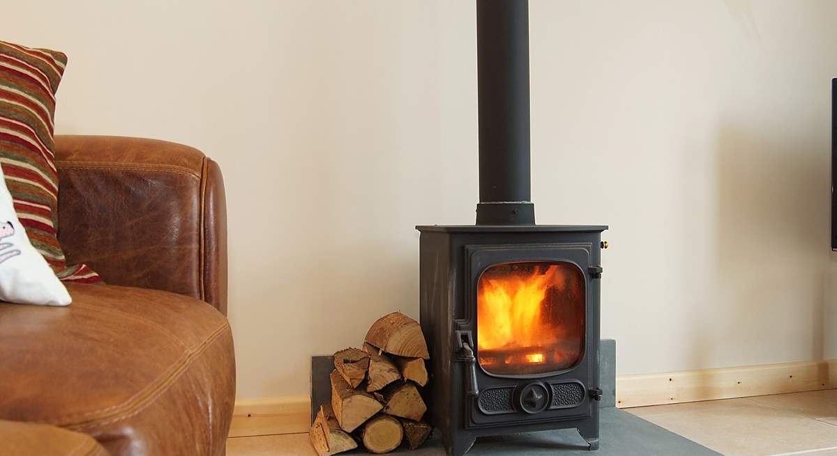 The little wood-burner provides a warming focal point.