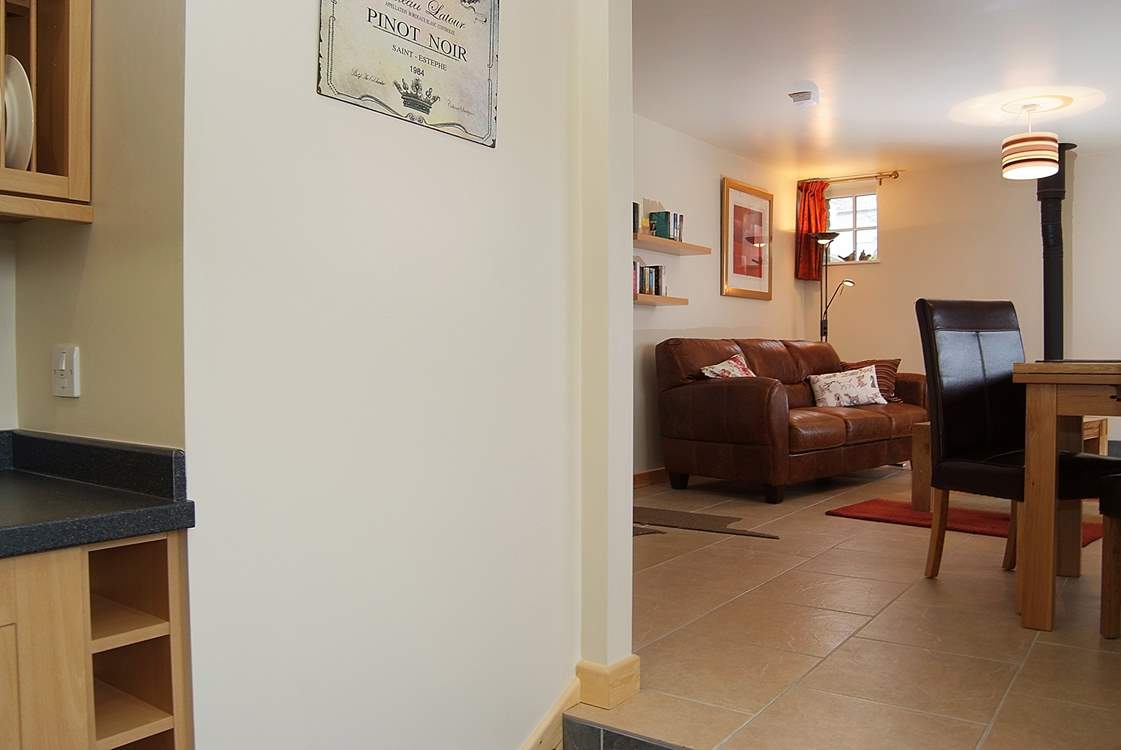 Looking up to the sitting and dining areas from the kitchen-area.