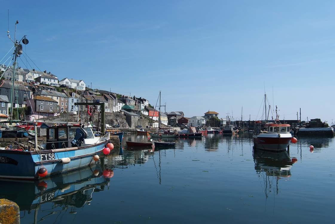 Mevagissey is 10 miles east, a thriving fishing village with narrow streets and lanes to explore.