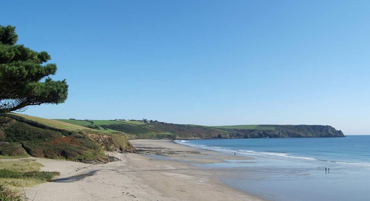 The neighbouring beaches of Pendower and Carne join at low tide to provide a vast expanse of golden sands.