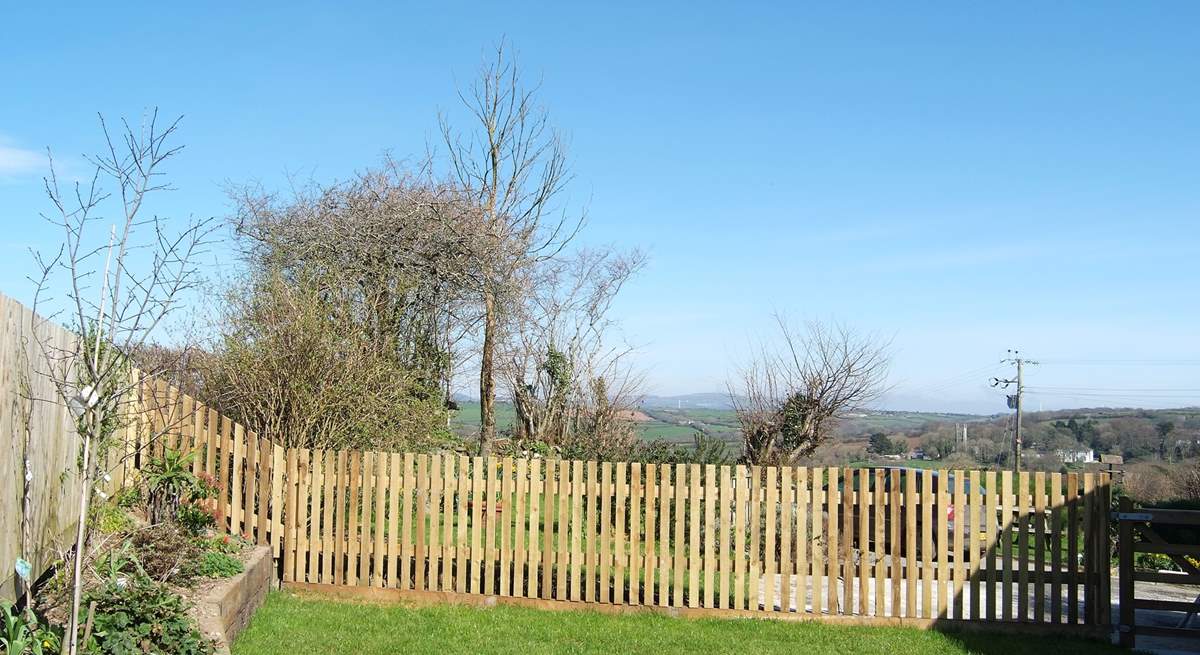 There are far reaching views over the Ladock valley from the enclosed garden.