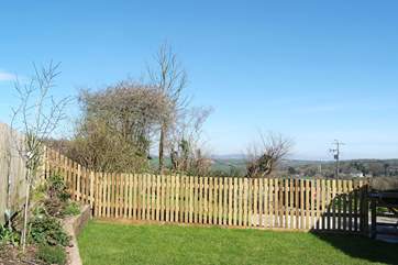 There are far reaching views over the Ladock valley from the enclosed garden.