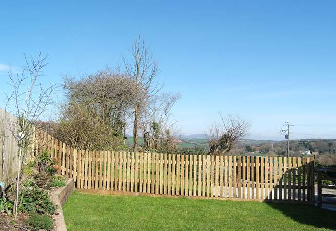 There are far reaching views over the Ladock valley from the enclosed garden.