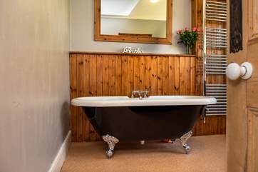 There is a family bathroom on the ground floor, enjoy a soak in the tub.