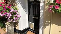 Through this door awaits a welcoming and charming holiday home.