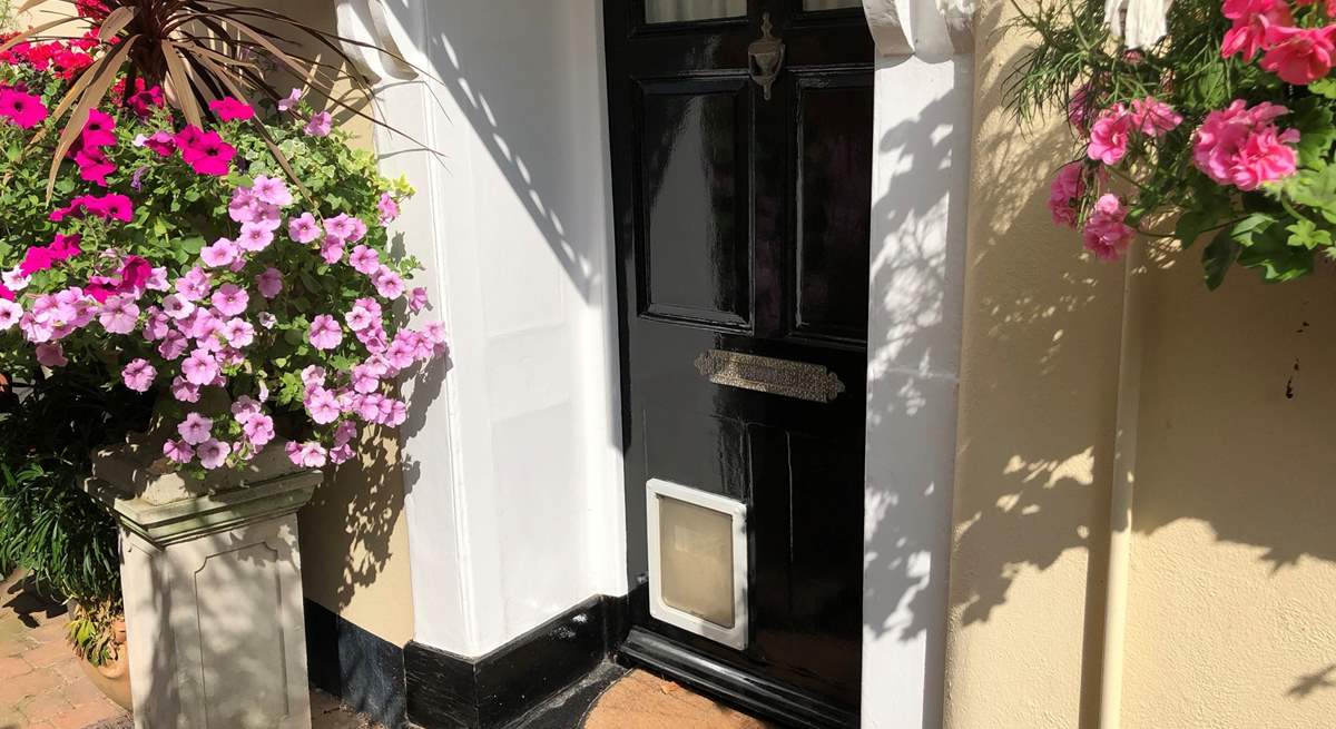 Through this door awaits a welcoming and charming holiday home.