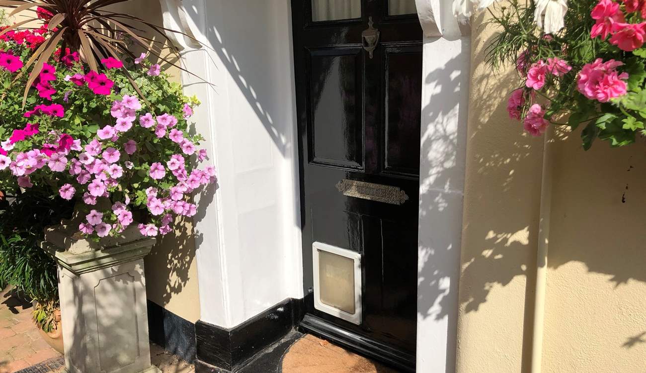 Through this door awaits a welcoming and charming holiday home.