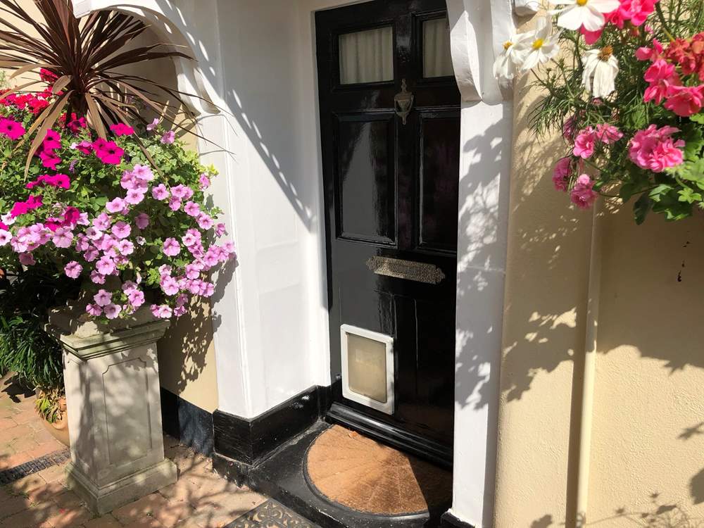 Through this door awaits a welcoming and charming holiday home.