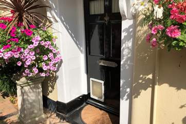 Through this door awaits a welcoming and charming holiday home.