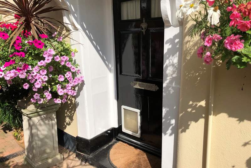 Through this door awaits a welcoming and charming holiday home.