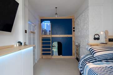 Bedroom two is home to these fabulous 'pods' and single bed.