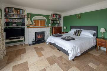 The bedroom/sitting-area is spacious and airy.