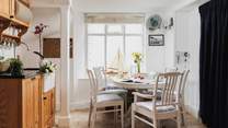 Gather everyone around the table to chat about the day ahead. 
