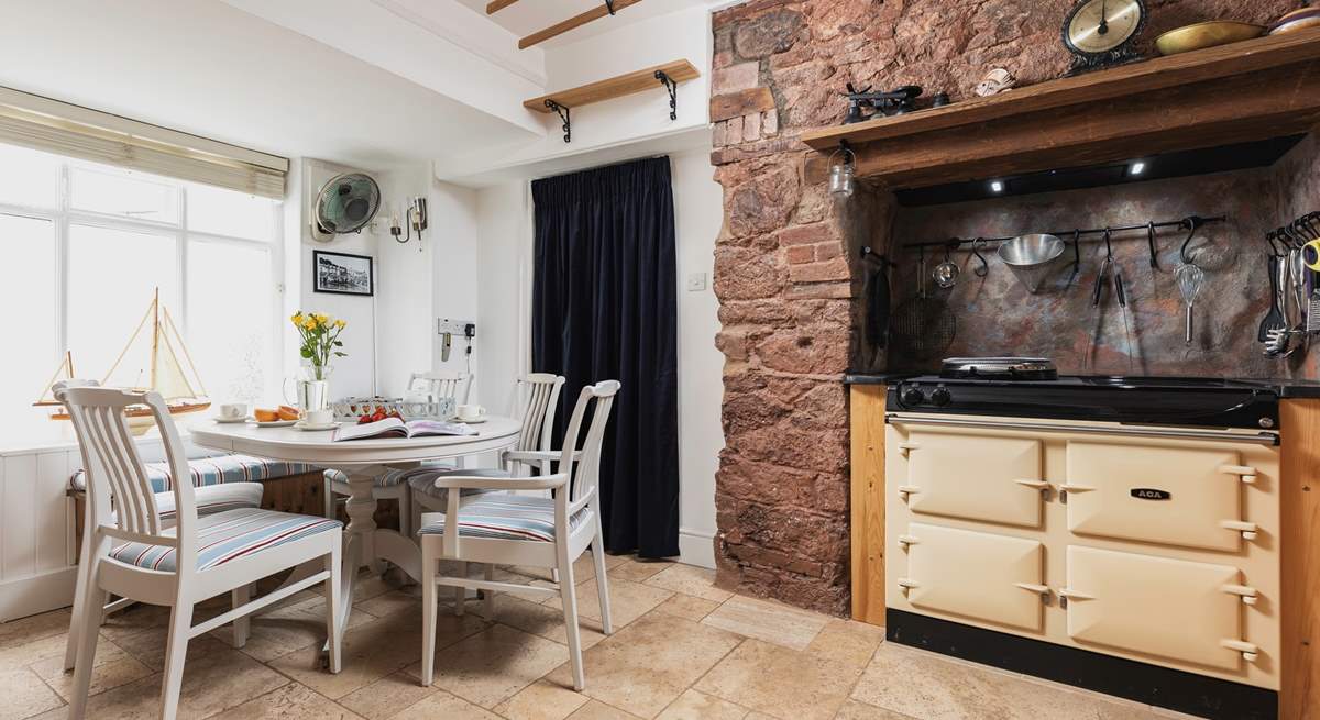 Such a lovely kitchen area with a fabulous dining-table to feast together at.