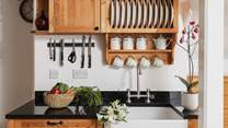 The characterful kitchen is equipped with everything you will need. 