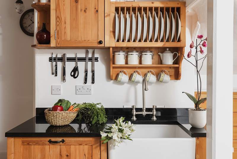 The characterful kitchen is equipped with everything you will need. 