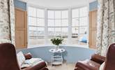 Watch the water world go by from the bay window. - Thumbnail Image